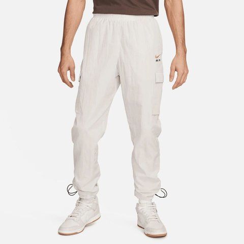 Брюки чоловічі Nike Sportswear Air Lightweight Woven Pants (FZ8371-104) FZ8371-104 фото